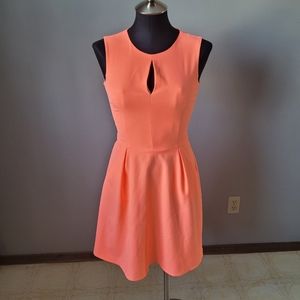 Neon coral mini skater dress with cutout